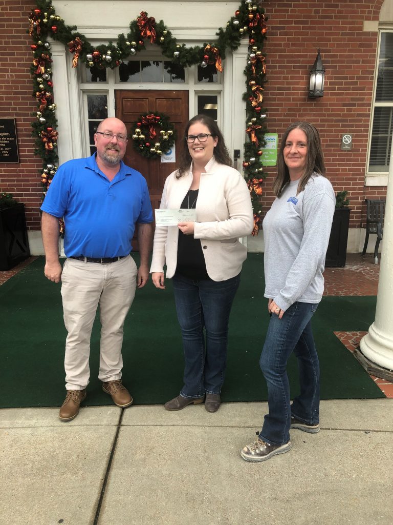 Representatives from The Chambliss Center for Children Receiving a Check From South Atlantic LLC