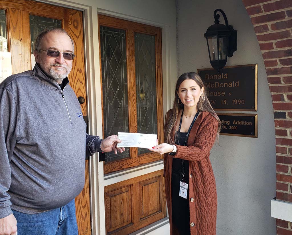 Representatives from The Ronald Mcdonald House of Greater Chattanooga Receiving a Check From South Atlantic LLC