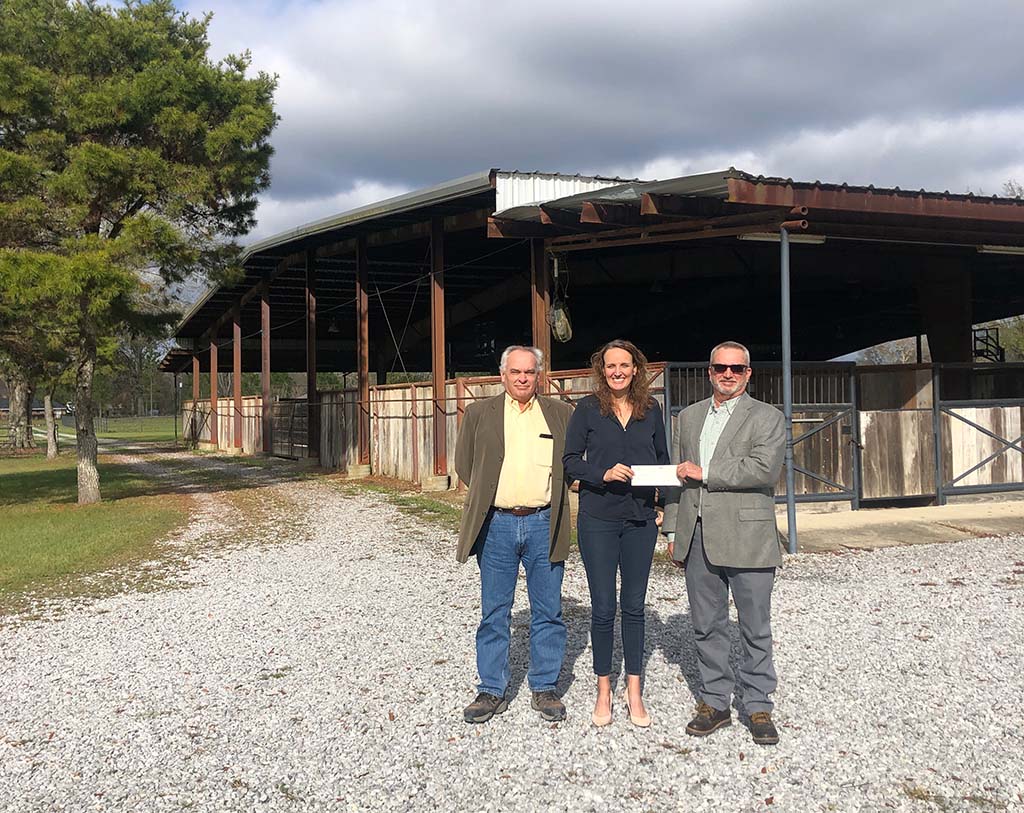 Representatives from Heritage Ranch Receiving a Check From South Atlantic LLC