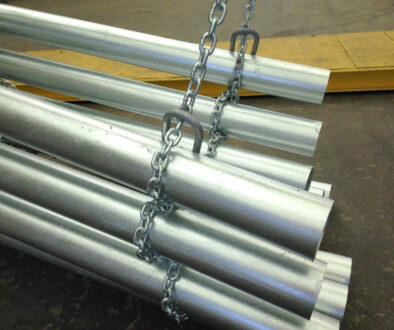 A Bundle Of Metal Pipes Wrapped By A Chain Can You Paint Galvanized Steel
