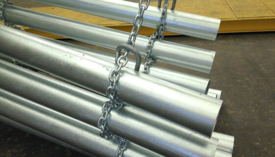 A Bundle Of Metal Pipes Wrapped By A Chain Can You Paint Galvanized Steel