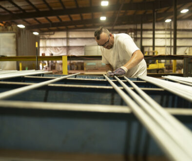 A South Atlantic Worker Cleaning off a Galvanized Steel Bar the History of South Atlantic