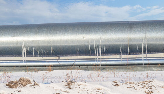 Closeup Of A Galvanized Steel Pipe With Ice Shards Hanging From It Galvanized Steel In Extreme Temperatures
