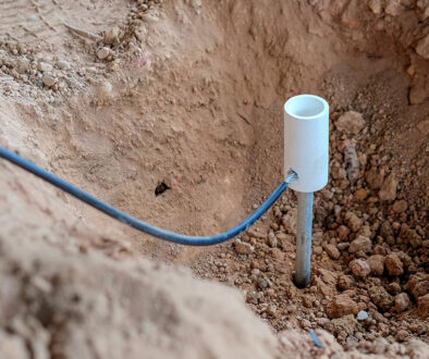 Closeup Of A Ground Rod Buried In A Dirt Hole Stainless Steel Or Galvanized Ground Rods